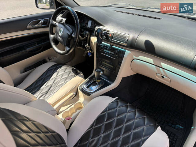 Черный Шкода Суперб, объемом двигателя 1.9 л и пробегом 270 тыс. км за 5400 $, фото 6 на Automoto.ua