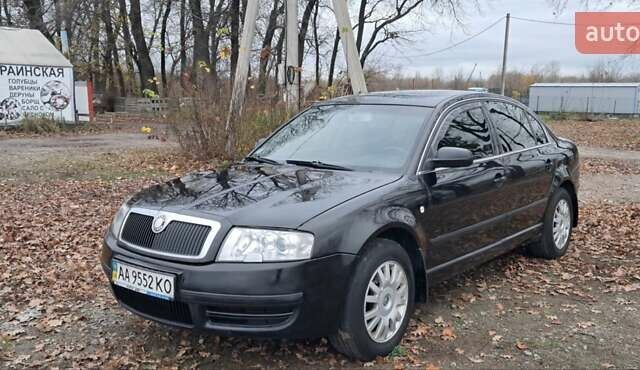 Черный Шкода Суперб, объемом двигателя 1.8 л и пробегом 302 тыс. км за 4500 $, фото 2 на Automoto.ua