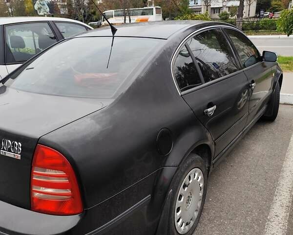 Черный Шкода Суперб, объемом двигателя 1.9 л и пробегом 275 тыс. км за 5300 $, фото 6 на Automoto.ua