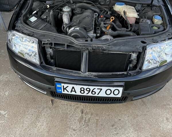 Черный Шкода Суперб, объемом двигателя 1.9 л и пробегом 503 тыс. км за 4500 $, фото 12 на Automoto.ua