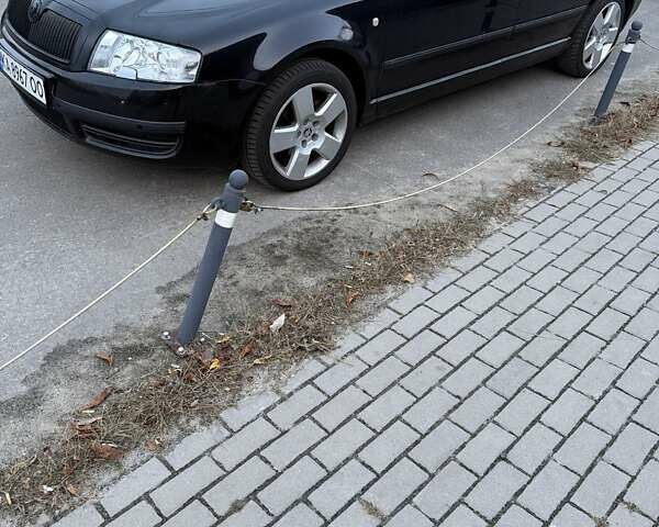 Черный Шкода Суперб, объемом двигателя 1.9 л и пробегом 503 тыс. км за 4500 $, фото 4 на Automoto.ua