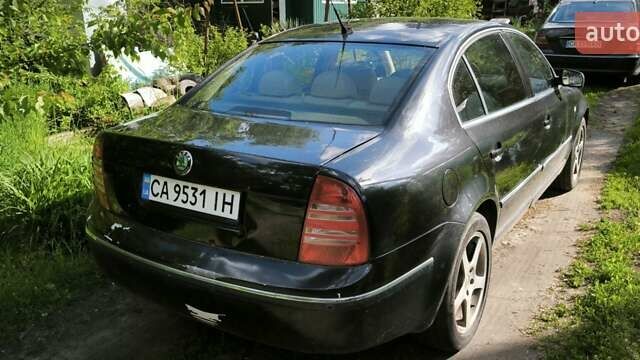 Черный Шкода Суперб, объемом двигателя 2.5 л и пробегом 303 тыс. км за 5900 $, фото 3 на Automoto.ua