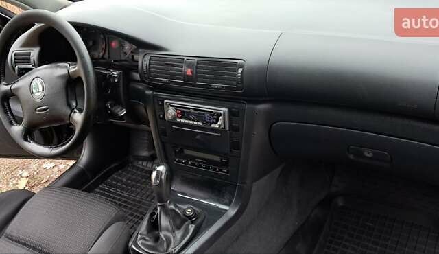 Черный Шкода Суперб, объемом двигателя 1.8 л и пробегом 302 тыс. км за 4500 $, фото 14 на Automoto.ua