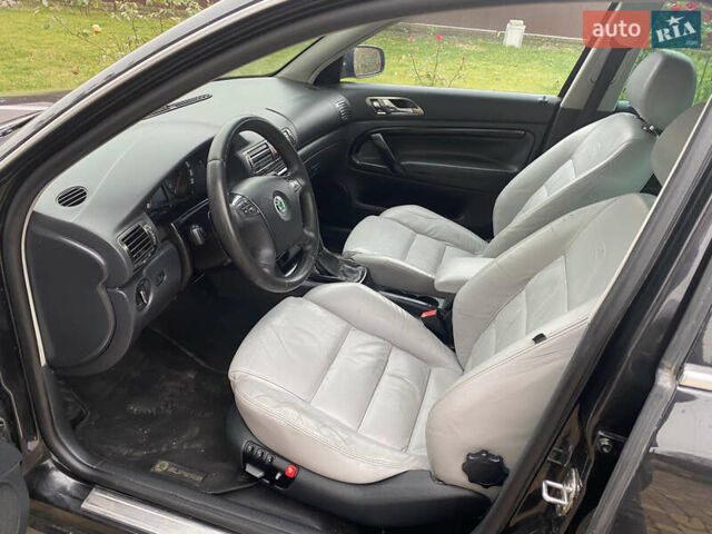 Черный Шкода Суперб, объемом двигателя 1.9 л и пробегом 300 тыс. км за 4600 $, фото 11 на Automoto.ua