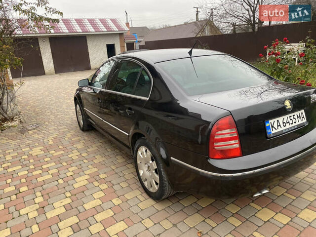 Черный Шкода Суперб, объемом двигателя 1.9 л и пробегом 300 тыс. км за 4600 $, фото 6 на Automoto.ua