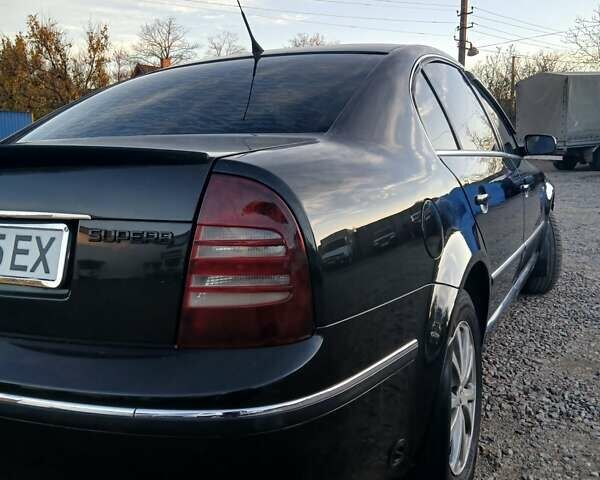 Шкода Суперб 2005 у Первомайськ на Automoto.ua Чорний Шкода Суперб, об'ємом двигуна 1.8 л та пробігом 456 тис. км за 5000 $, фото 11 на Automoto.ua
