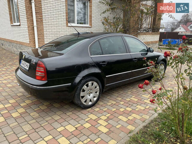 Черный Шкода Суперб, объемом двигателя 1.9 л и пробегом 300 тыс. км за 4600 $, фото 4 на Automoto.ua