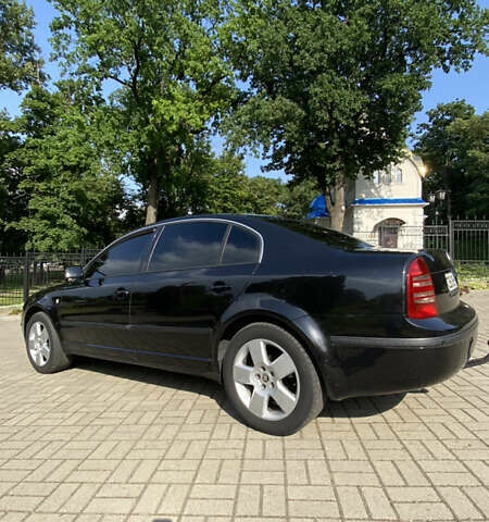 Черный Шкода Суперб, объемом двигателя 1.97 л и пробегом 336 тыс. км за 5400 $, фото 2 на Automoto.ua