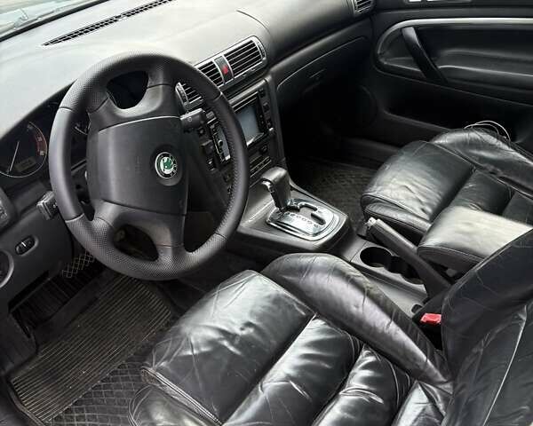 Черный Шкода Суперб, объемом двигателя 1.8 л и пробегом 280 тыс. км за 4450 $, фото 7 на Automoto.ua