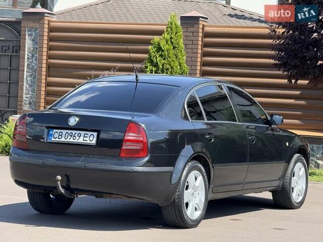 Черный Шкода Суперб, объемом двигателя 1.97 л и пробегом 340 тыс. км за 5600 $, фото 26 на Automoto.ua