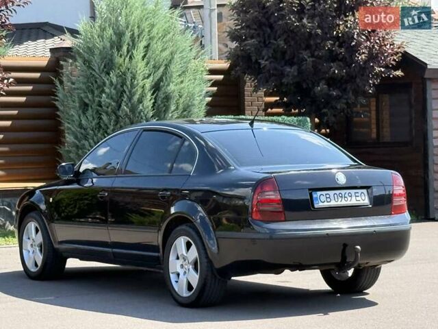 Черный Шкода Суперб, объемом двигателя 1.97 л и пробегом 340 тыс. км за 5600 $, фото 16 на Automoto.ua