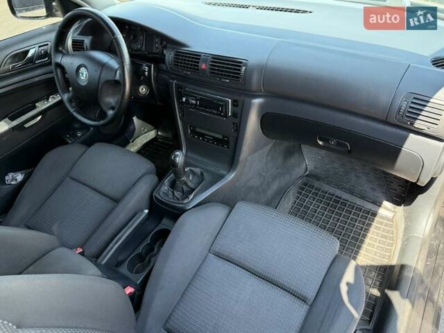 Черный Шкода Суперб, объемом двигателя 1.97 л и пробегом 340 тыс. км за 5600 $, фото 45 на Automoto.ua