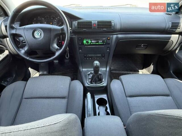 Черный Шкода Суперб, объемом двигателя 1.97 л и пробегом 340 тыс. км за 5600 $, фото 49 на Automoto.ua