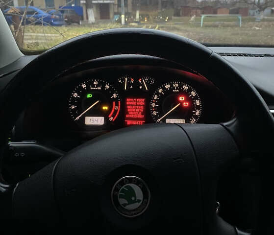 Черный Шкода Суперб, объемом двигателя 1.8 л и пробегом 215 тыс. км за 7000 $, фото 10 на Automoto.ua