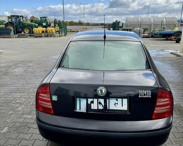 Черный Шкода Суперб, объемом двигателя 1.78 л и пробегом 182 тыс. км за 6000 $, фото 5 на Automoto.ua
