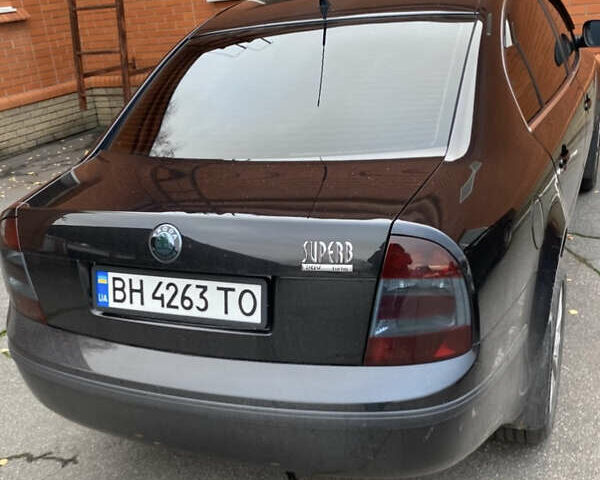 Черный Шкода Суперб, объемом двигателя 1.8 л и пробегом 215 тыс. км за 7000 $, фото 2 на Automoto.ua