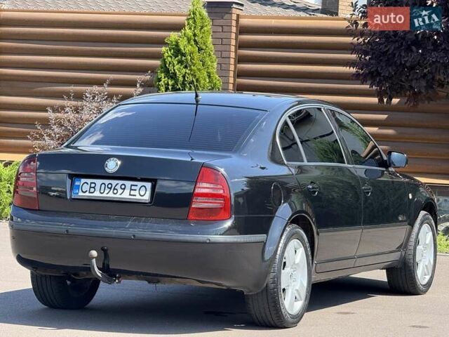 Черный Шкода Суперб, объемом двигателя 1.97 л и пробегом 340 тыс. км за 5600 $, фото 25 на Automoto.ua