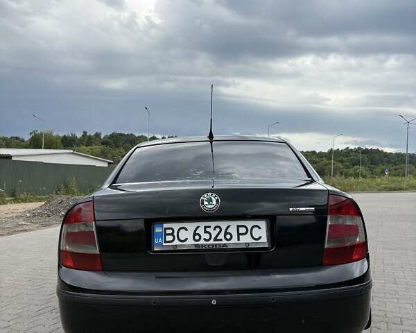 Черный Шкода Суперб, объемом двигателя 1.8 л и пробегом 280 тыс. км за 4450 $, фото 2 на Automoto.ua