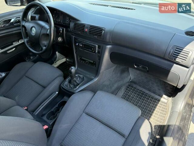 Черный Шкода Суперб, объемом двигателя 1.97 л и пробегом 340 тыс. км за 5600 $, фото 44 на Automoto.ua