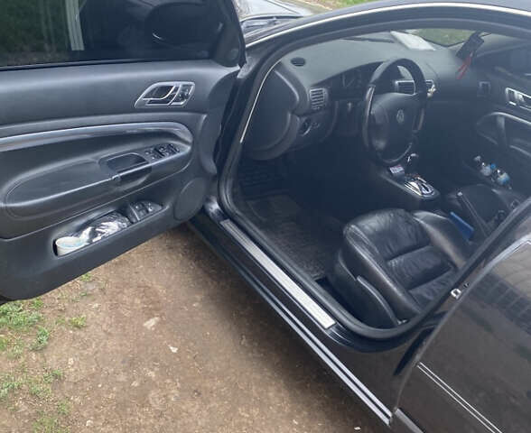 Черный Шкода Суперб, объемом двигателя 1.8 л и пробегом 215 тыс. км за 7000 $, фото 4 на Automoto.ua