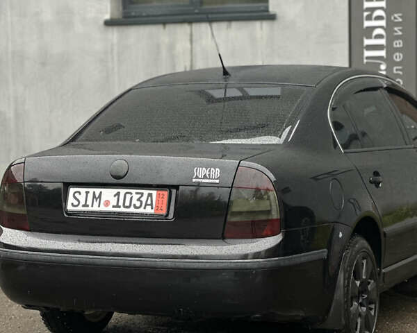 Черный Шкода Суперб, объемом двигателя 1.8 л и пробегом 326 тыс. км за 4399 $, фото 17 на Automoto.ua