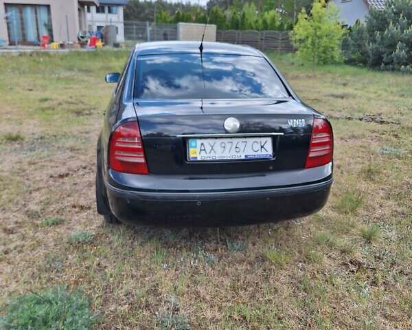 Черный Шкода Суперб, объемом двигателя 1.8 л и пробегом 325 тыс. км за 5500 $, фото 3 на Automoto.ua