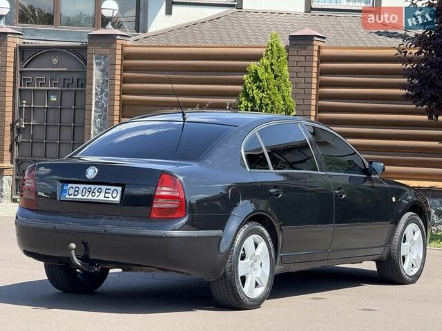 Черный Шкода Суперб, объемом двигателя 1.97 л и пробегом 340 тыс. км за 5600 $, фото 27 на Automoto.ua