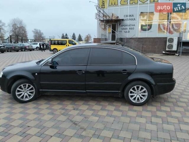Черный Шкода Суперб, объемом двигателя 1.9 л и пробегом 240 тыс. км за 5600 $, фото 4 на Automoto.ua