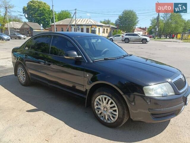 Черный Шкода Суперб, объемом двигателя 1.8 л и пробегом 303 тыс. км за 5000 $, фото 1 на Automoto.ua