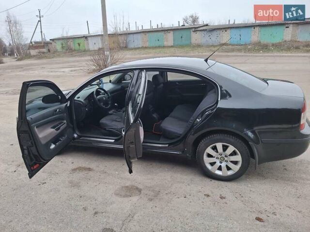 Черный Шкода Суперб, объемом двигателя 1.78 л и пробегом 245 тыс. км за 6500 $, фото 9 на Automoto.ua