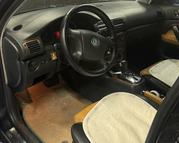 Черный Шкода Суперб, объемом двигателя 1.78 л и пробегом 337 тыс. км за 6500 $, фото 9 на Automoto.ua