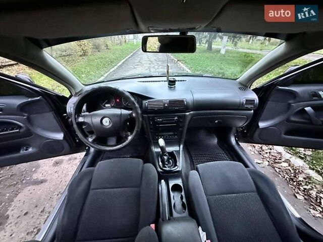 Черный Шкода Суперб, объемом двигателя 1.9 л и пробегом 356 тыс. км за 4500 $, фото 6 на Automoto.ua