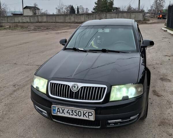 Черный Шкода Суперб, объемом двигателя 1.78 л и пробегом 245 тыс. км за 6500 $, фото 11 на Automoto.ua