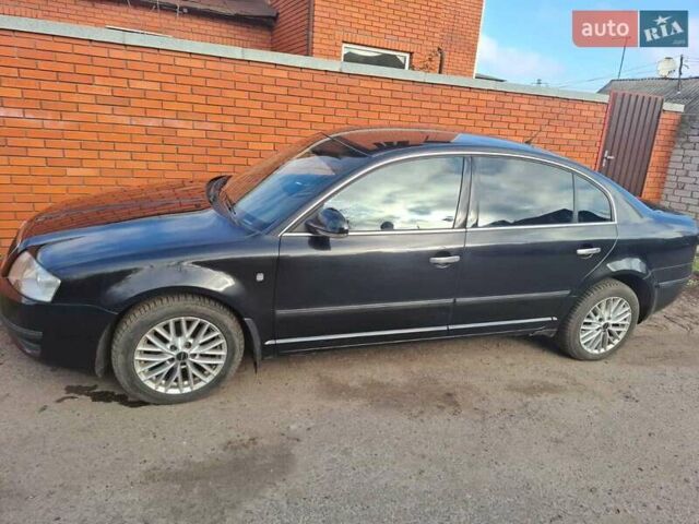 Черный Шкода Суперб, объемом двигателя 1.78 л и пробегом 170 тыс. км за 6000 $, фото 4 на Automoto.ua