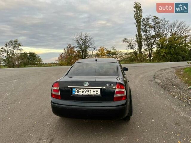 Черный Шкода Суперб, объемом двигателя 1.78 л и пробегом 340 тыс. км за 4800 $, фото 12 на Automoto.ua