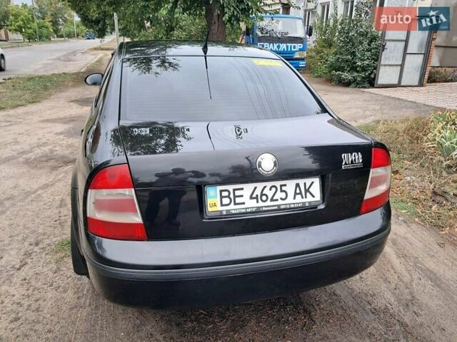 Черный Шкода Суперб, объемом двигателя 1.78 л и пробегом 302 тыс. км за 5300 $, фото 4 на Automoto.ua