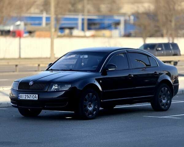 Черный Шкода Суперб, объемом двигателя 1.9 л и пробегом 335 тыс. км за 6000 $, фото 14 на Automoto.ua