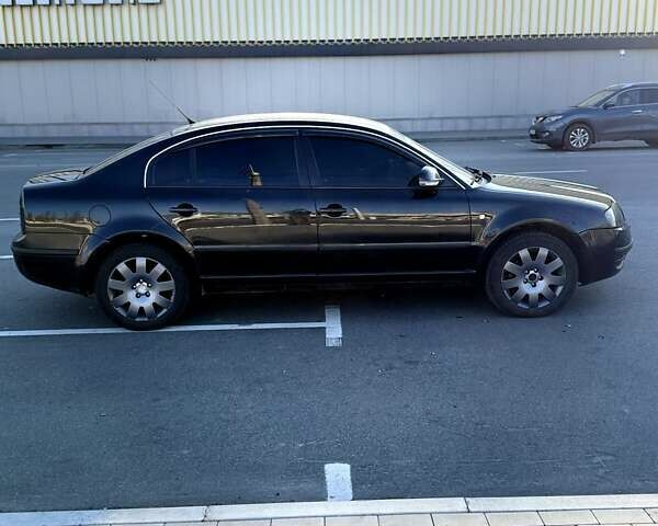 Черный Шкода Суперб, объемом двигателя 1.9 л и пробегом 335 тыс. км за 6000 $, фото 5 на Automoto.ua