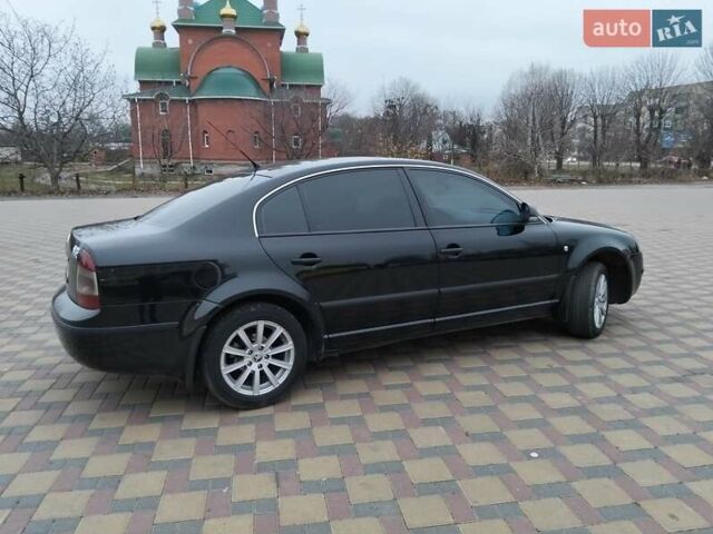 Черный Шкода Суперб, объемом двигателя 1.9 л и пробегом 240 тыс. км за 5600 $, фото 1 на Automoto.ua