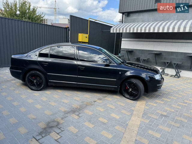 Черный Шкода Суперб, объемом двигателя 2 л и пробегом 210 тыс. км за 6299 $, фото 1 на Automoto.ua