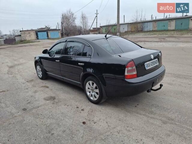 Черный Шкода Суперб, объемом двигателя 1.78 л и пробегом 245 тыс. км за 6500 $, фото 10 на Automoto.ua