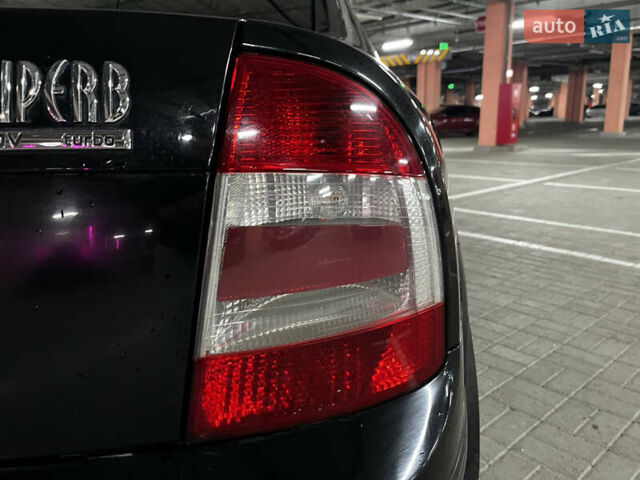 Черный Шкода Суперб, объемом двигателя 1.78 л и пробегом 290 тыс. км за 5300 $, фото 12 на Automoto.ua