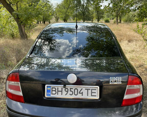 Черный Шкода Суперб, объемом двигателя 1.8 л и пробегом 218 тыс. км за 6700 $, фото 2 на Automoto.ua