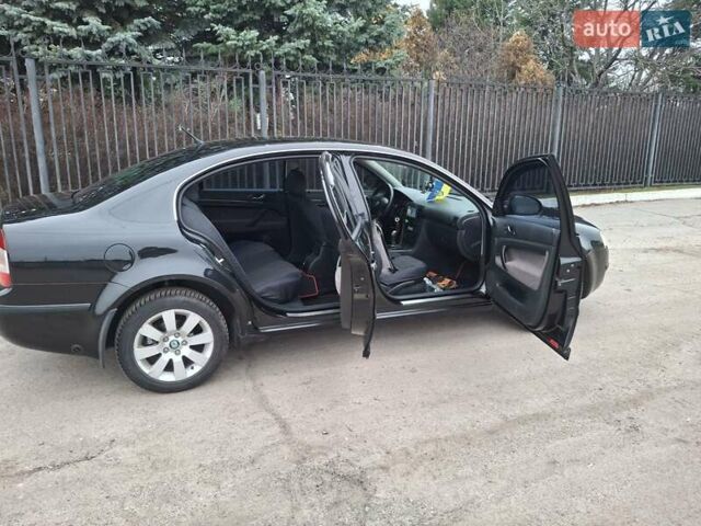 Черный Шкода Суперб, объемом двигателя 1.78 л и пробегом 245 тыс. км за 6500 $, фото 8 на Automoto.ua
