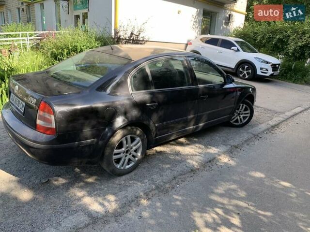 Черный Шкода Суперб, объемом двигателя 1.8 л и пробегом 248 тыс. км за 5400 $, фото 4 на Automoto.ua