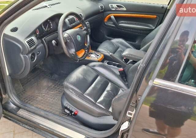 Черный Шкода Суперб, объемом двигателя 2.5 л и пробегом 289 тыс. км за 6300 $, фото 14 на Automoto.ua