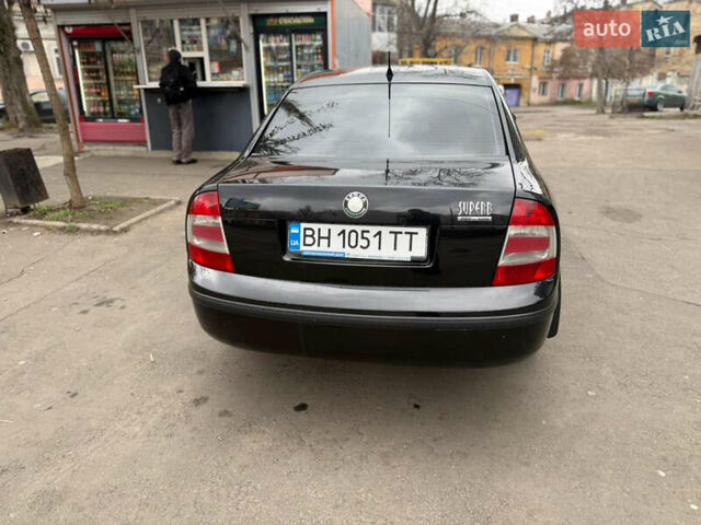 Черный Шкода Суперб, объемом двигателя 1.78 л и пробегом 381 тыс. км за 5500 $, фото 1 на Automoto.ua