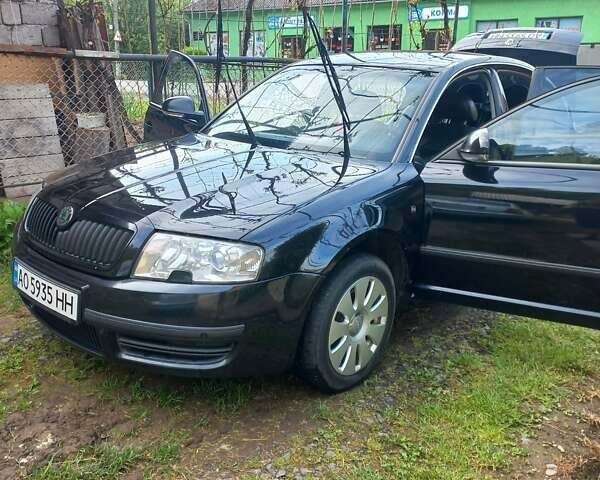 Черный Шкода Суперб, объемом двигателя 1.9 л и пробегом 318 тыс. км за 5700 $, фото 14 на Automoto.ua