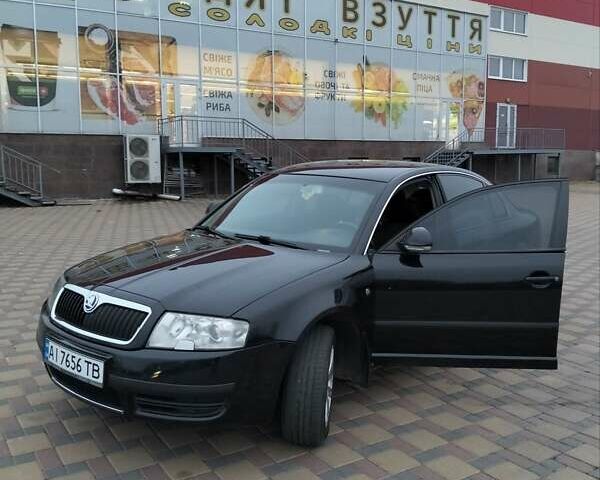 Черный Шкода Суперб, объемом двигателя 1.9 л и пробегом 240 тыс. км за 5600 $, фото 5 на Automoto.ua