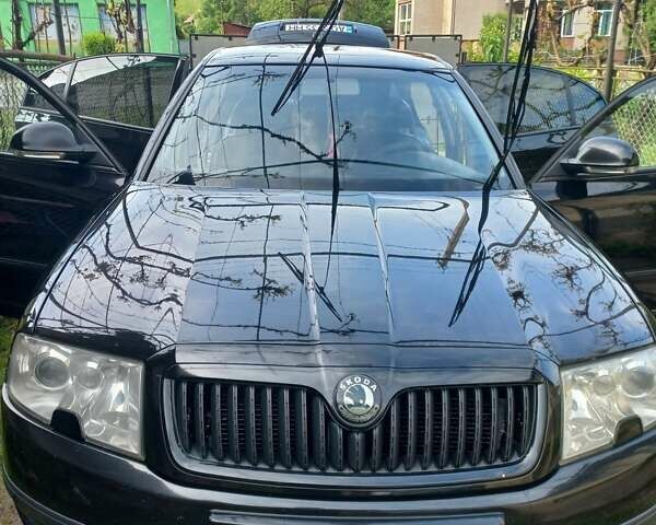 Черный Шкода Суперб, объемом двигателя 1.9 л и пробегом 318 тыс. км за 5700 $, фото 13 на Automoto.ua